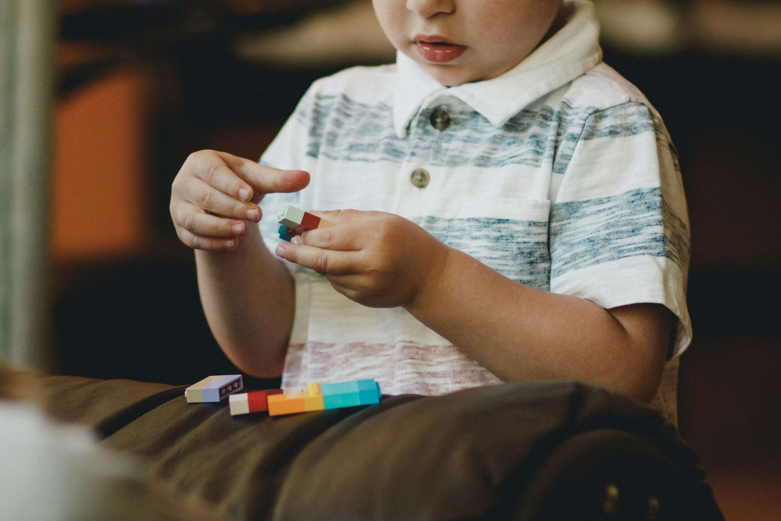 Calm, sensory‑friendly environment with soft toys and neutral colours, representing neurodevelopmental assessment and support.
